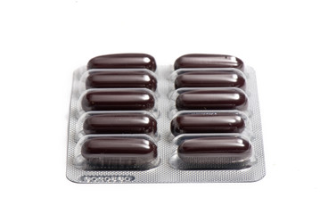 packs of vitamins on the white isolated background