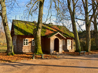 Fototapeta na wymiar old wooden rural house in autumn time