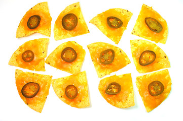 A dozen nachos isolated on white background.