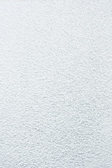 Flat background surface completely covered in frozt and snow