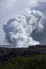Lava on Hawai'i from Mt. Kilauea hitting the ocean