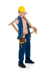 Young handsome male construction worker. Studio shot,