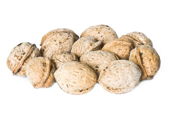 walnuts in a shell on a white background