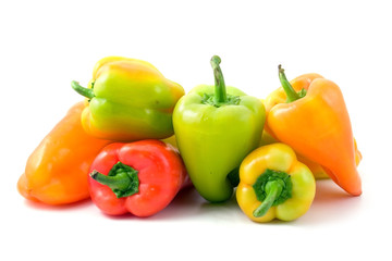 multi-coloured peppers isolated on white