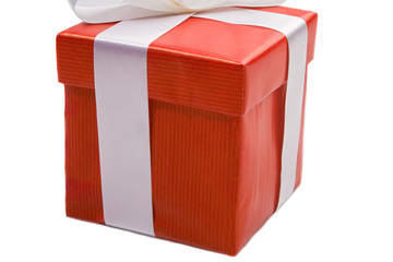Beautiful red gift on a over white background