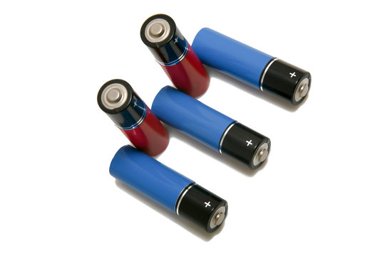 Five cylindrical batteries on a white background