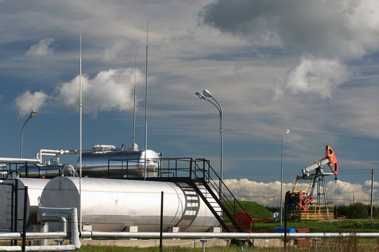 Oil pump and storage tanks