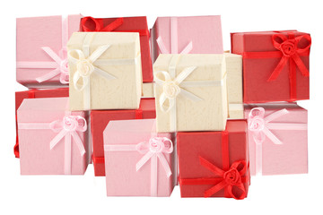 red, pink and beige gift boxed pile