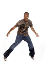 young African American man leaping in the air
