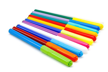 Colorful markers isolated on white.