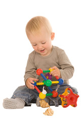 little boy play with toys. isolated on a white background