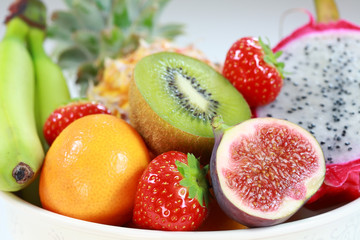 Delicious fresh fruits in bowl as dessert