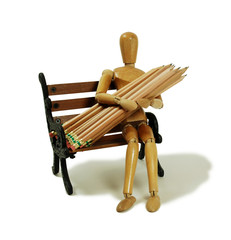 Wooden model holding wooden pencils used for drawing