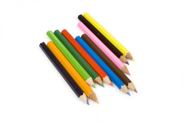Coloured drawing pencils isolated on a white studio background.