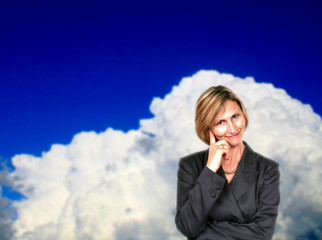 Beautiful woman in the clouds
