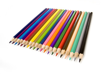 Coloured drawing pencils isolated on a white studio background.