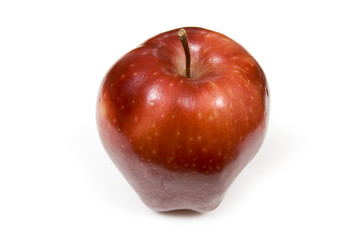 Red apple isolated on a white studio background.