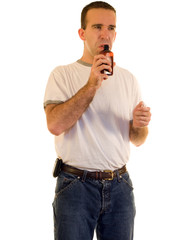A man smelling some cough medicine