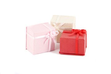 scattered, colorful small gift boxes for giving