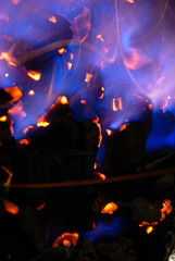 Fototapeta na wymiar Fire of hot blue flames .