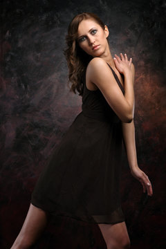 young female model in a black dress