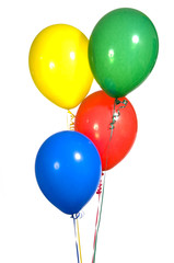 Primary colored party balloons with ribbons
