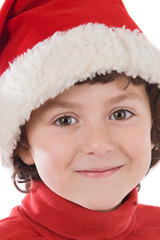 Adorable boy with red hat of Christmas isolated