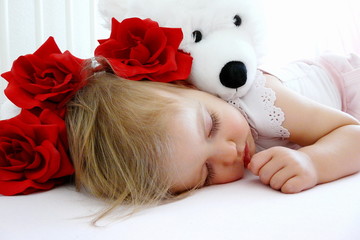 Little baby girl sleep with Teddy Bear