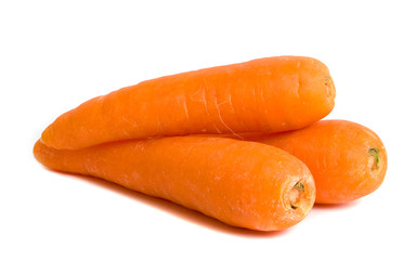 Three carrots isolated over white background