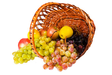 inverted hamper with fruits isolated on the white background