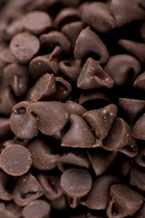 Vertical image of a chocolate chip pile.