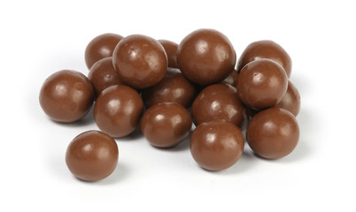 chocolate candy balls on white background
