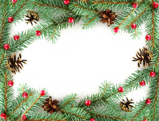 Border from branches with cones and red balls