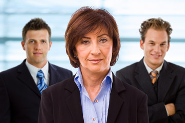 Team portrait of smiling business people.