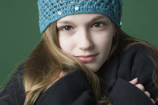 Teenager All Bundled Up In Warm Clothing