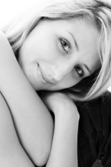 Closeup portrait of lovely blond. Black-and-white photo