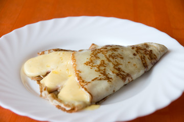 rosy pancake with cheese and ham