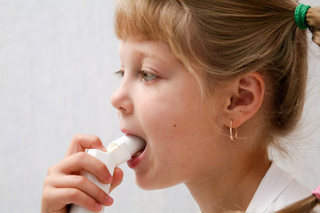 An image of a child making inhalation
