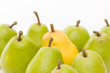 yellow and green pears on white with copy space
