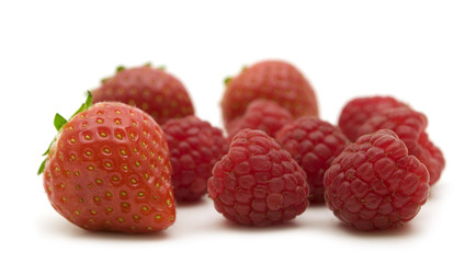 strawberry and raspberry on white background