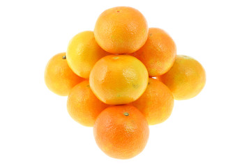 Pyramid of tangerines on white.