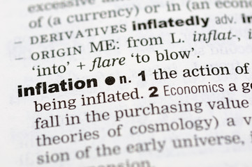 A close up of the word inflation from a dictionary