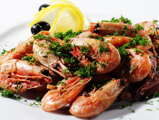 Shrimps Plate Served with Lemon and Olives