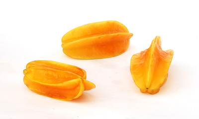 Three carambolas isolated on white background