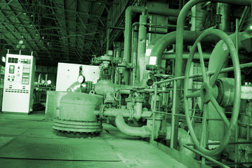 different size and shaped pipes and valves at a power plant