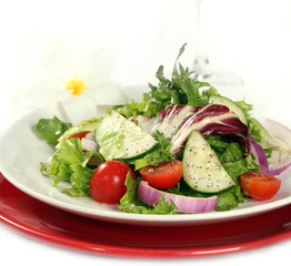 Bright Healthy Fresh Salad on White Background