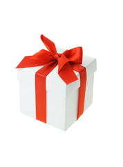 White gift box with red bow ribbon on white