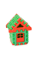 Small toy house isolated on the white