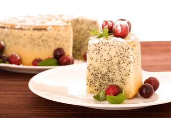 Poppy seed cake on isolated white