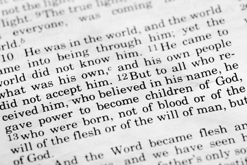 Obraz premium Bible detail of John 1:12 , a popular New Testament passage